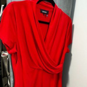 Red DKNY V neck, drape front short sleeve top. Size large